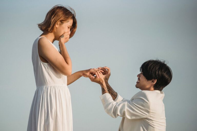 A heartfelt marriage proposal moment captured at sunset, symbolizing love and commitment.